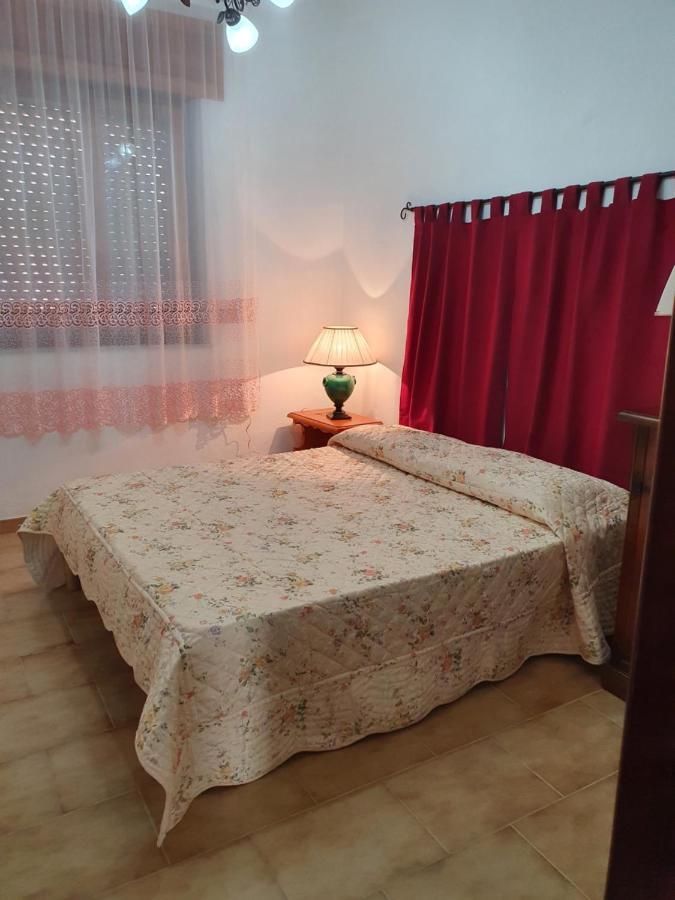 Appartamento A Telti Con Giardino Privato E Posto Auto ภายนอก รูปภาพ