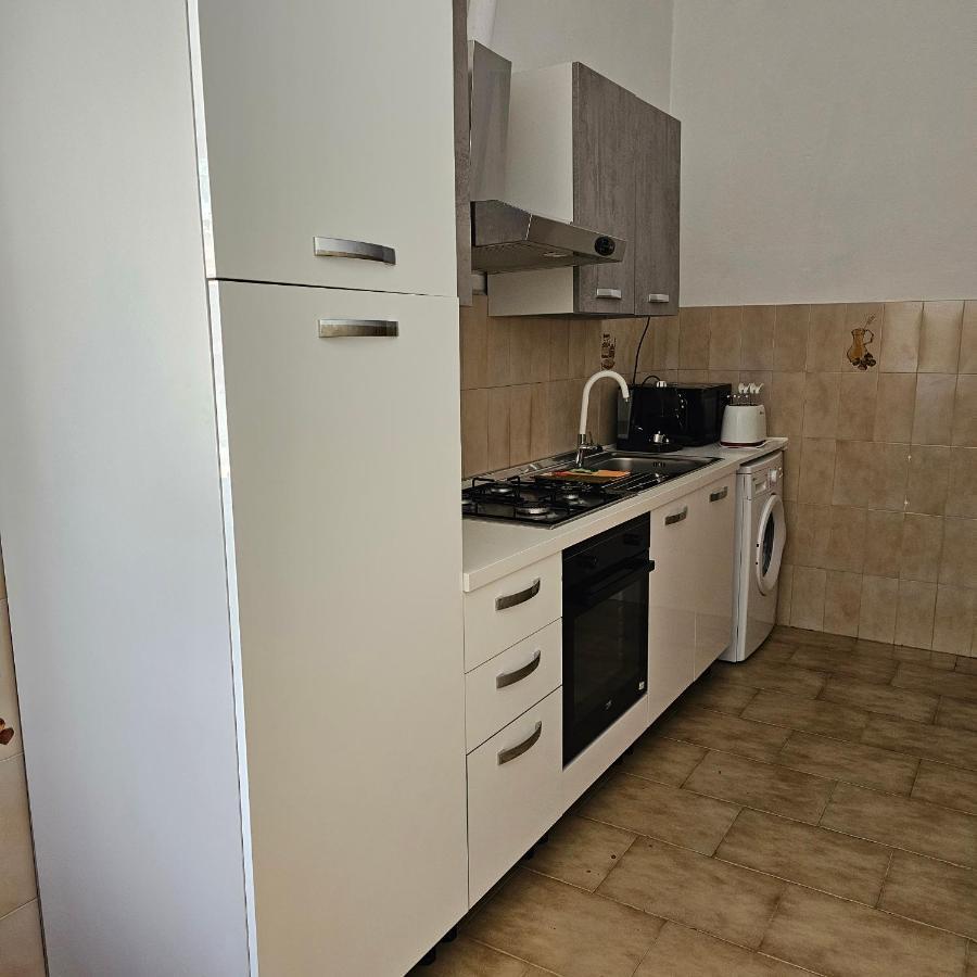 Appartamento A Telti Con Giardino Privato E Posto Auto ภายนอก รูปภาพ